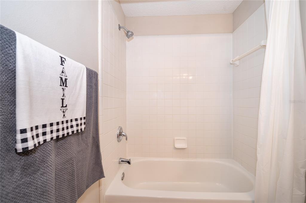 1652 Riveredge Road Oviedo, FL 32766 - Photo 17 of 22 a bathroom with a bathtub and shower