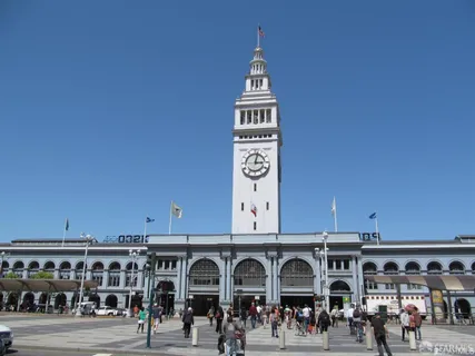 a view of a building with lots of people