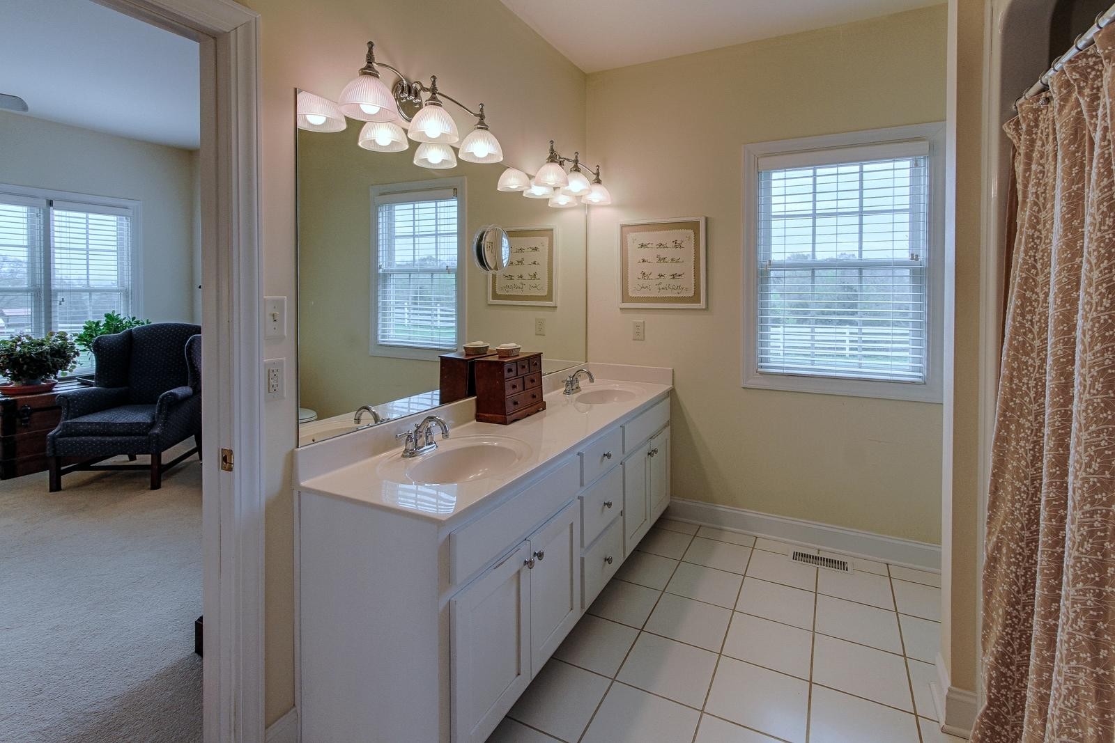 350 Cliff Top Road Blaine, TN 37709 - Photo 18 of 34 a bathroom with a sink a vanity and a mirror