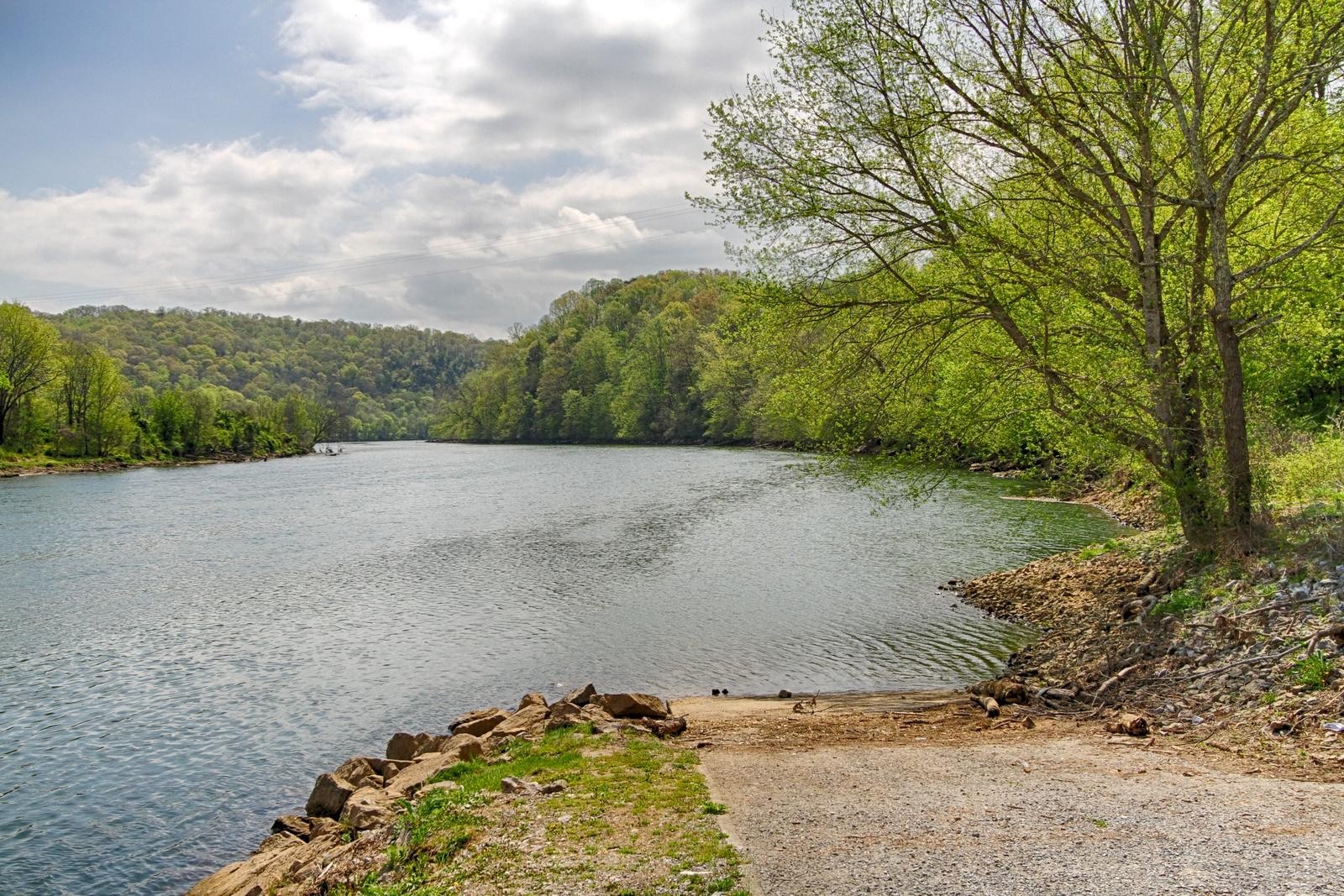 350 Cliff Top Road Blaine, TN 37709 - Photo 6 of 34 a view of a lake with a city