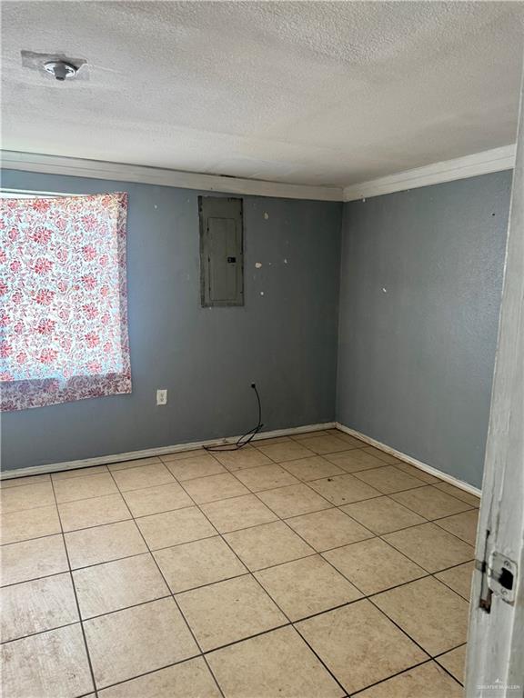 210 West Monte Cristo Road, Unit R Edinburg, TX 78541 - Photo 14 of 18 a view of an empty room and window