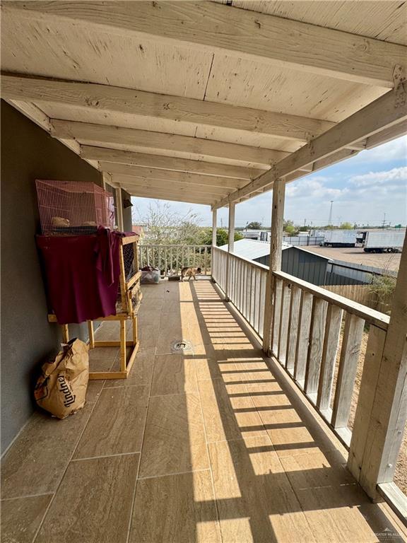 210 West Monte Cristo Road, Unit R Edinburg, TX 78541 - Photo 15 of 18 a view of a chairs and table in the balcony