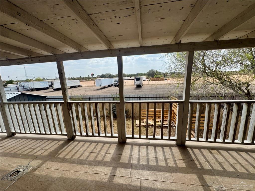 210 West Monte Cristo Road, Unit R Edinburg, TX 78541 - Photo 16 of 18 a view of a balcony with wooden floor