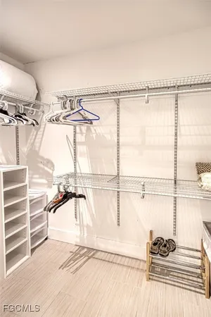 a view of a room with racks on the wall