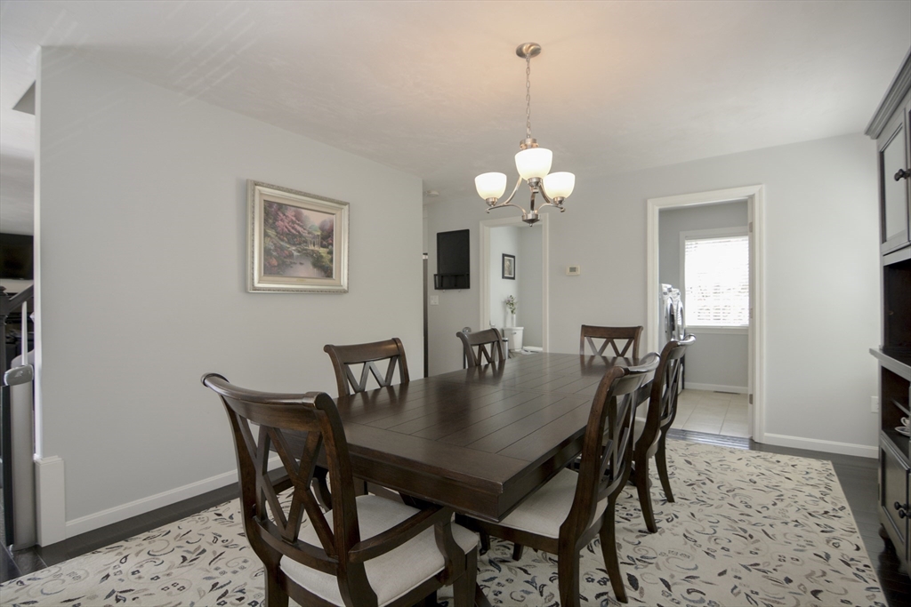 12 Gedney Drive Peabody, MA 01960 - Photo 13 of 41 a view of a dining room with a table and chairs