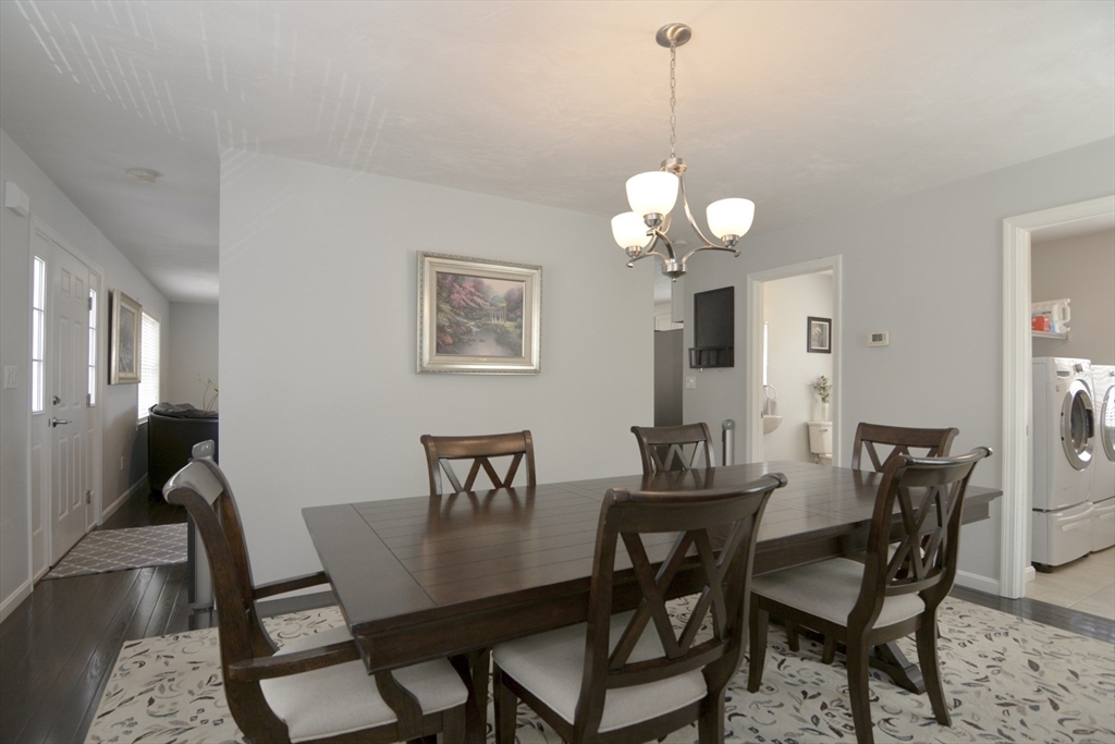 12 Gedney Drive Peabody, MA 01960 - Photo 14 of 41 a view of a dining room with furniture and wooden floor