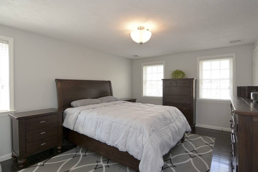 12 Gedney Drive Peabody, MA 01960 - Photo 24 of 41 a bedroom with a bed and a window