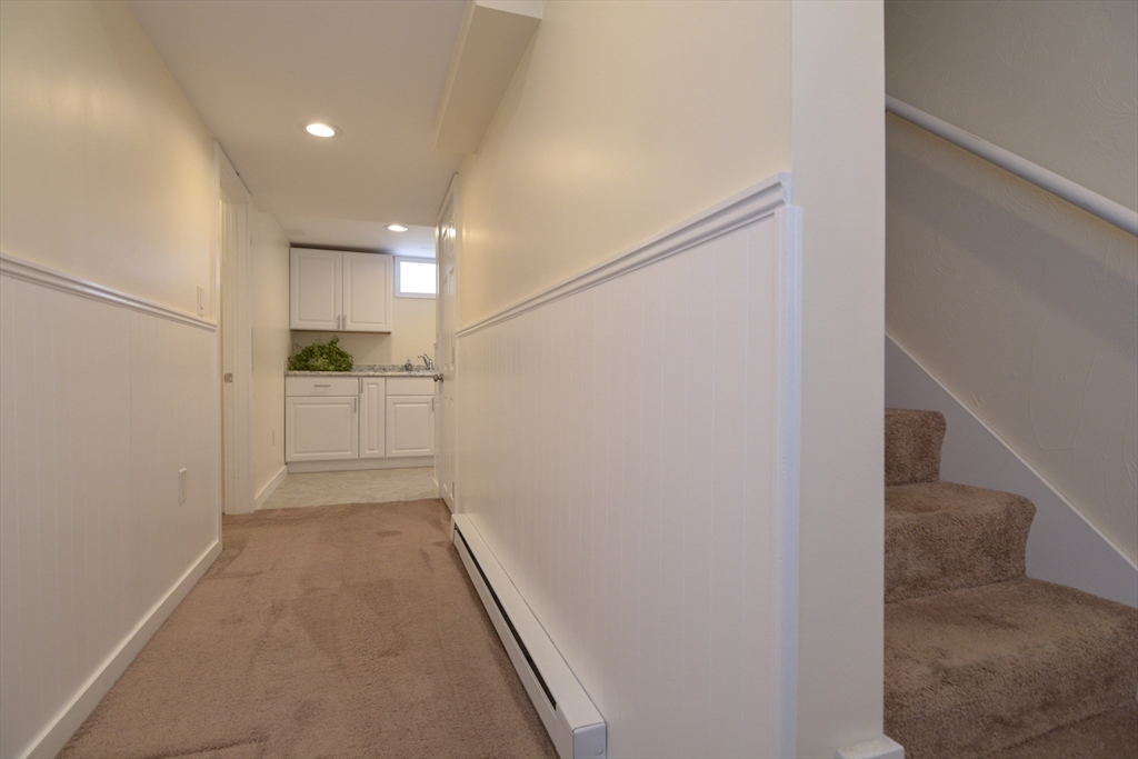 12 Gedney Drive Peabody, MA 01960 - Photo 28 of 41 a view of a hallway to an empty room and entrance