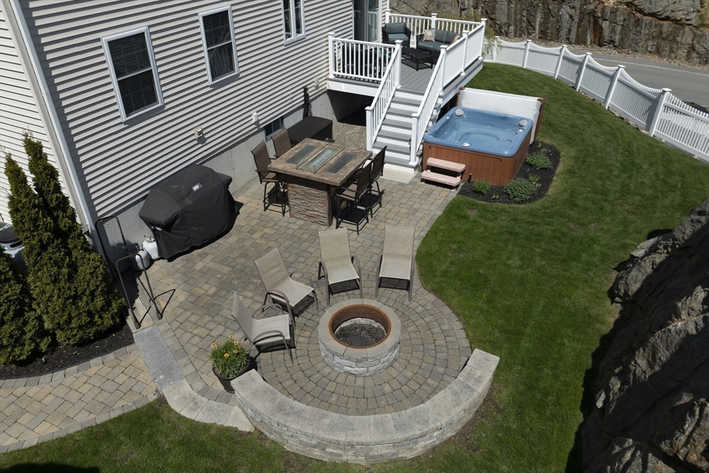 12 Gedney Drive Peabody, MA 01960 - Photo 37 of 41 an aerial view of a house with swimming pool and furniture