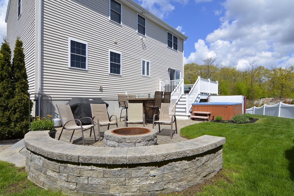12 Gedney Drive Peabody, MA 01960 - Photo 39 of 41 a view of a house with backyard and sitting area