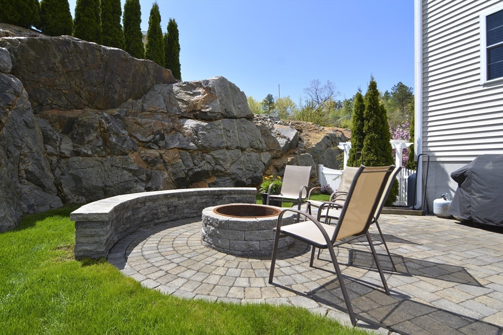 12 Gedney Drive Peabody, MA 01960 - Photo 40 of 41 a view of a chairs and table in backyard