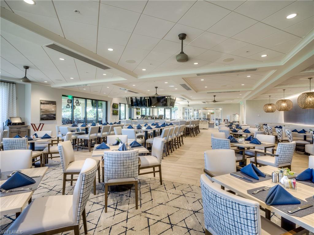 8471 Southbridge Drive, Unit 1 Estero, FL 33967 - Photo 35 of 37 a large room with lots of furniture and a view of living room