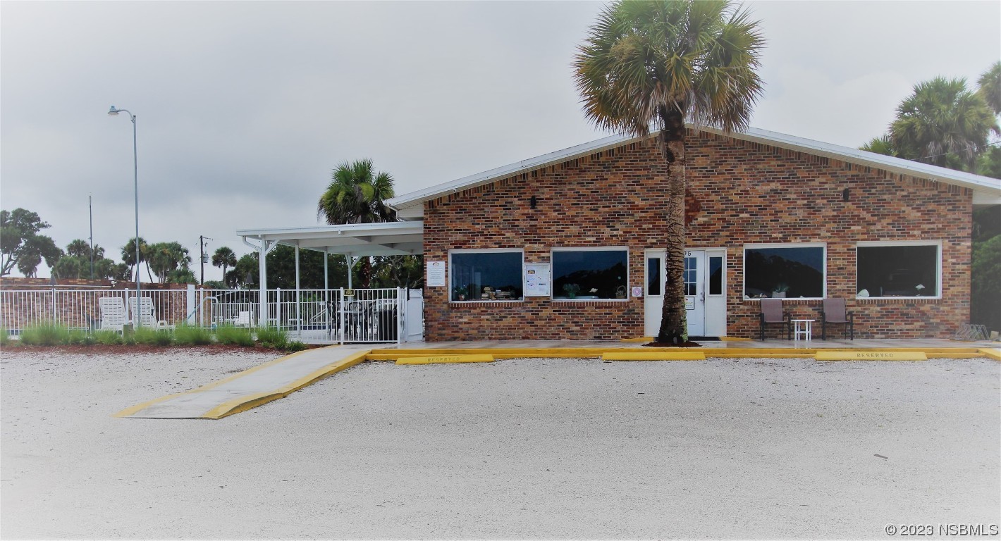 105 Oak Street Edgewater, FL 32141 - Photo 23 of 29 a view of a house with swimming pool and a yard