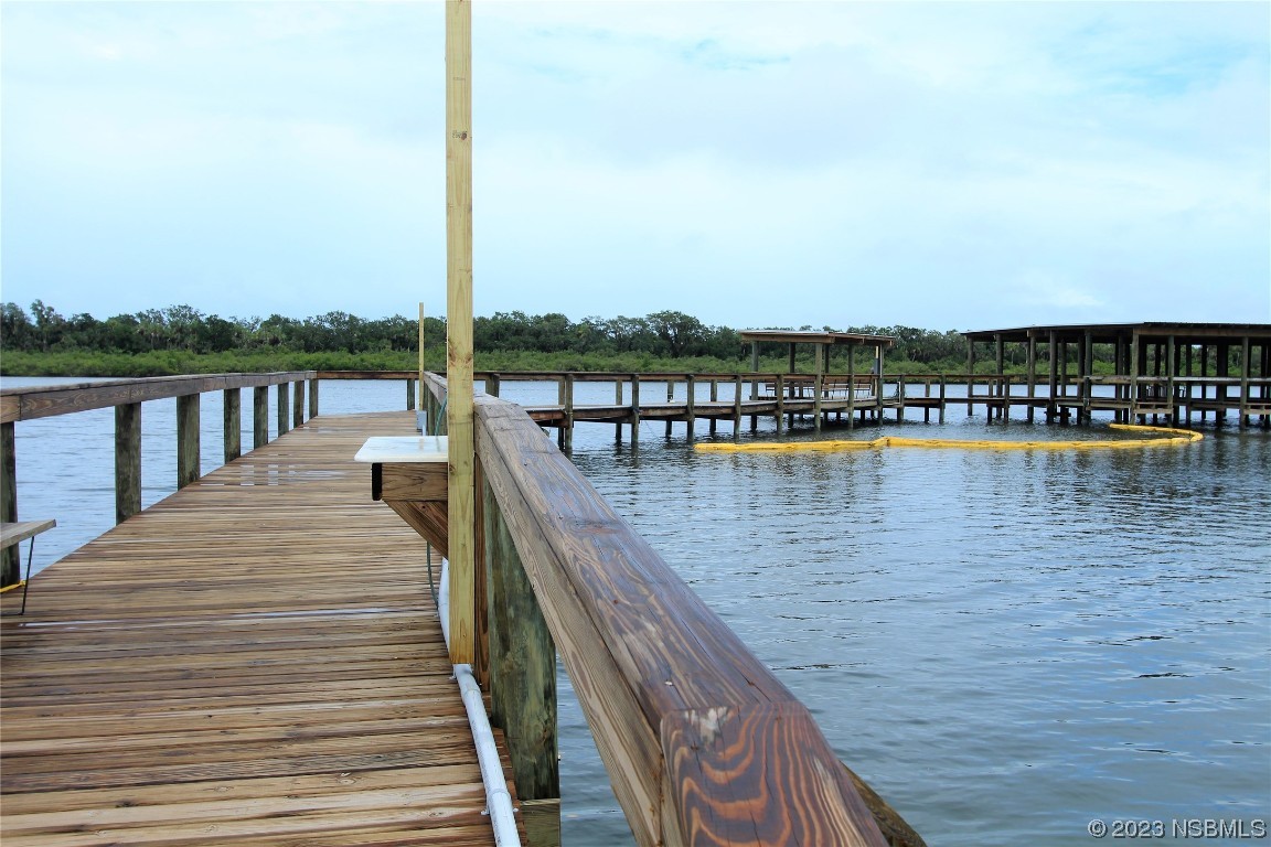 105 Oak Street Edgewater, FL 32141 - Photo 27 of 29 a view of a lake from a balcony