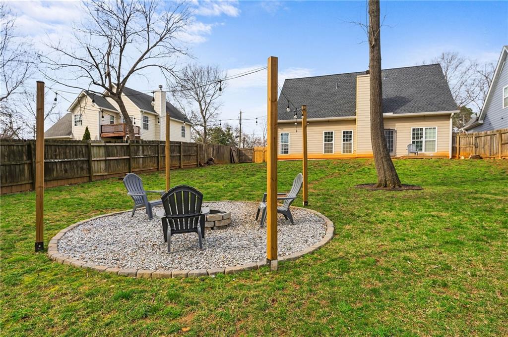 293 Jordan Street Southeast Atlanta, GA 30315 - Photo 24 of 26 a view of a house with backyard and sitting area