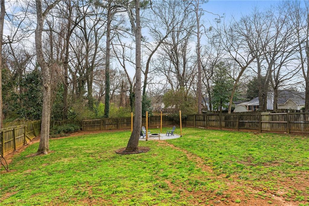 293 Jordan Street Southeast Atlanta, GA 30315 - Photo 26 of 26 a view of a backyard with a small cabin
