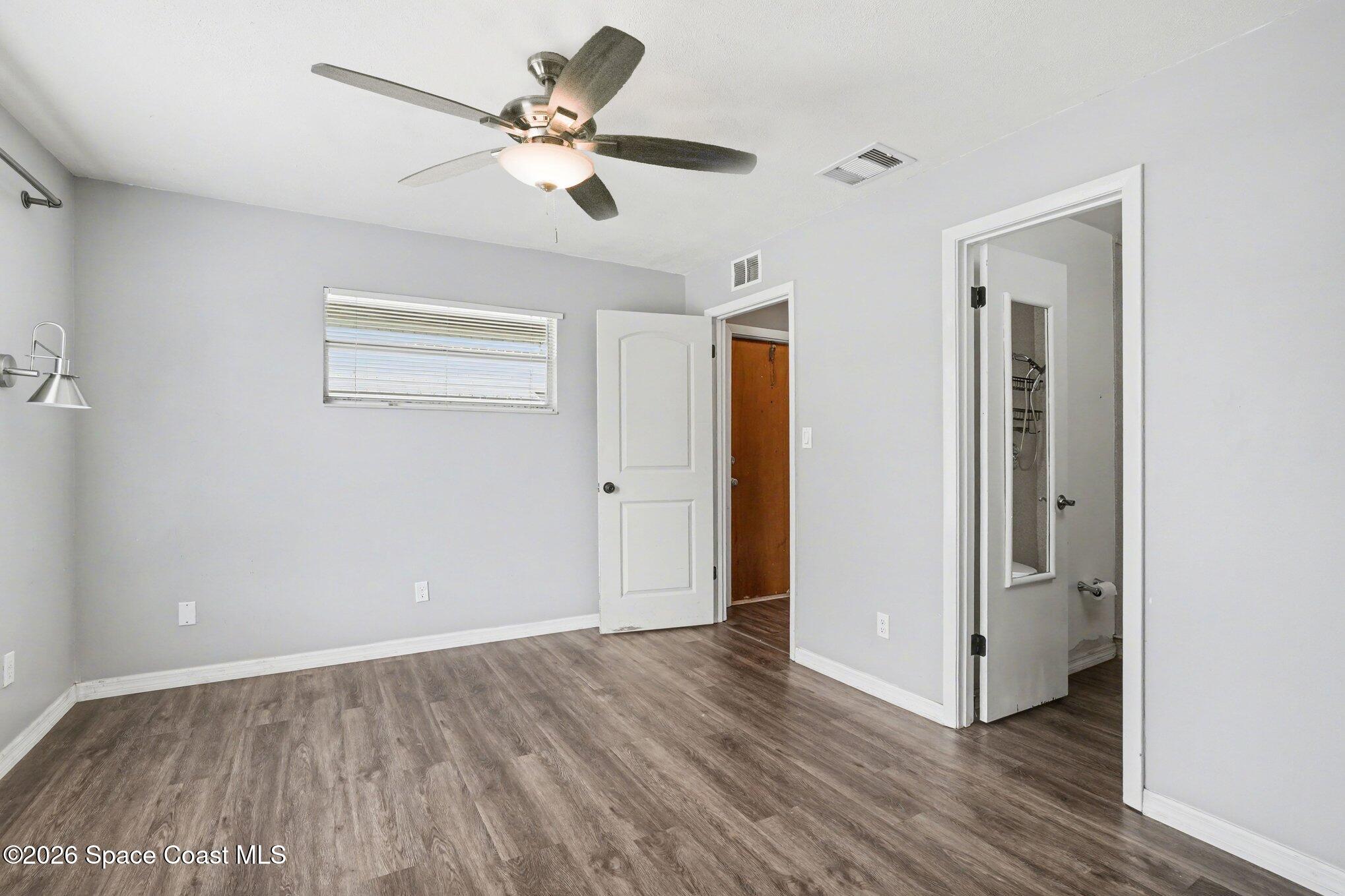 2870 Locksley Road Melbourne, FL 32935 - Photo 12 of 26 Primary Bedroom