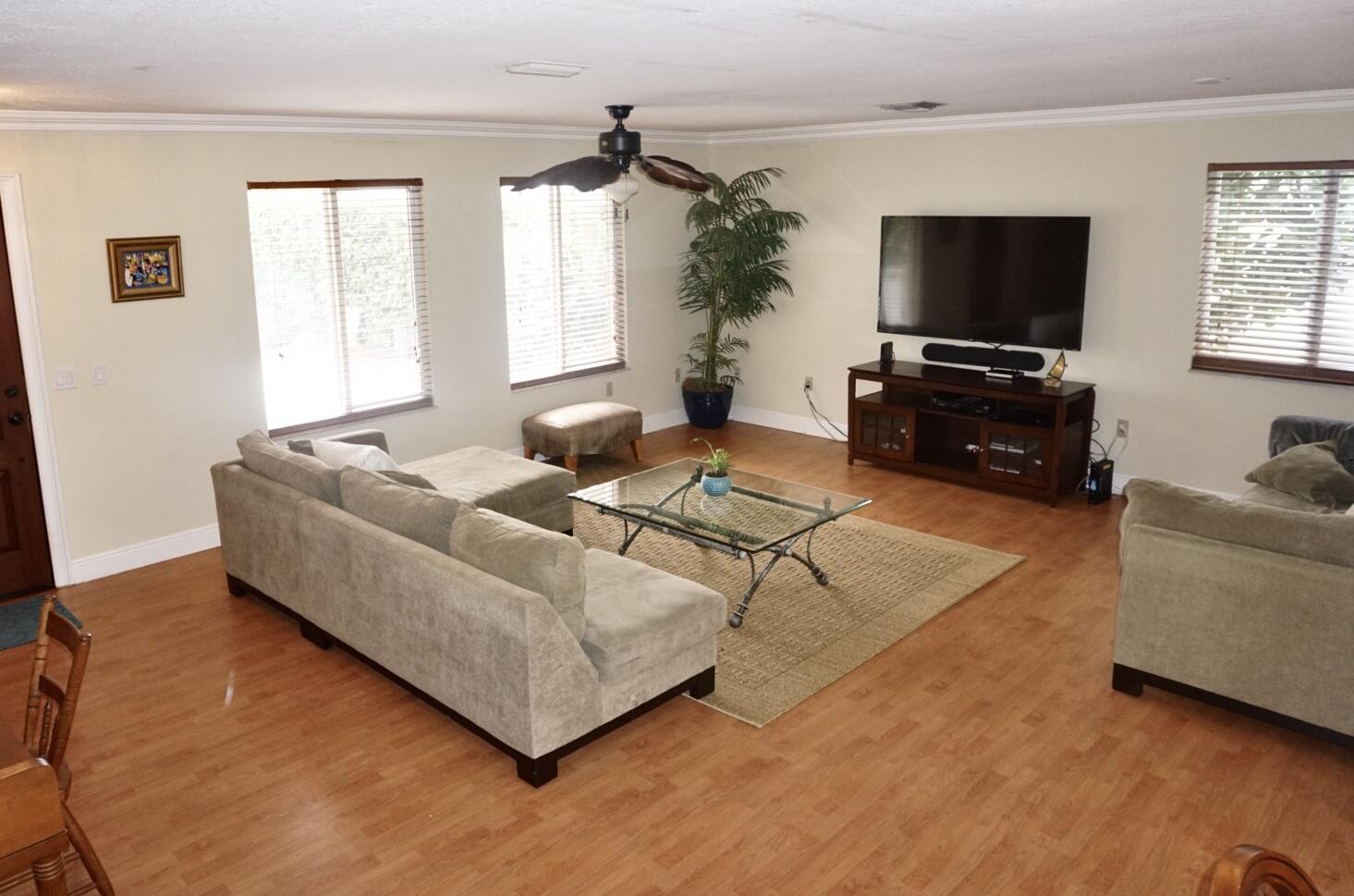 6259 Garrett Street Jupiter, FL 33458 - Photo 3 of 19 0E0C4D66-B3A5-4A71-A478-C1EC88C42F32