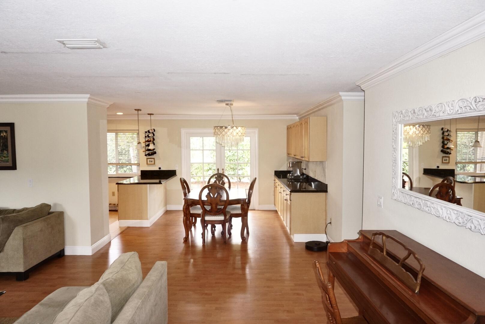 6259 Garrett Street Jupiter, FL 33458 - Photo 4 of 19 ADEAFB7B-98A1-46E7-9C9A-2C60622901CC