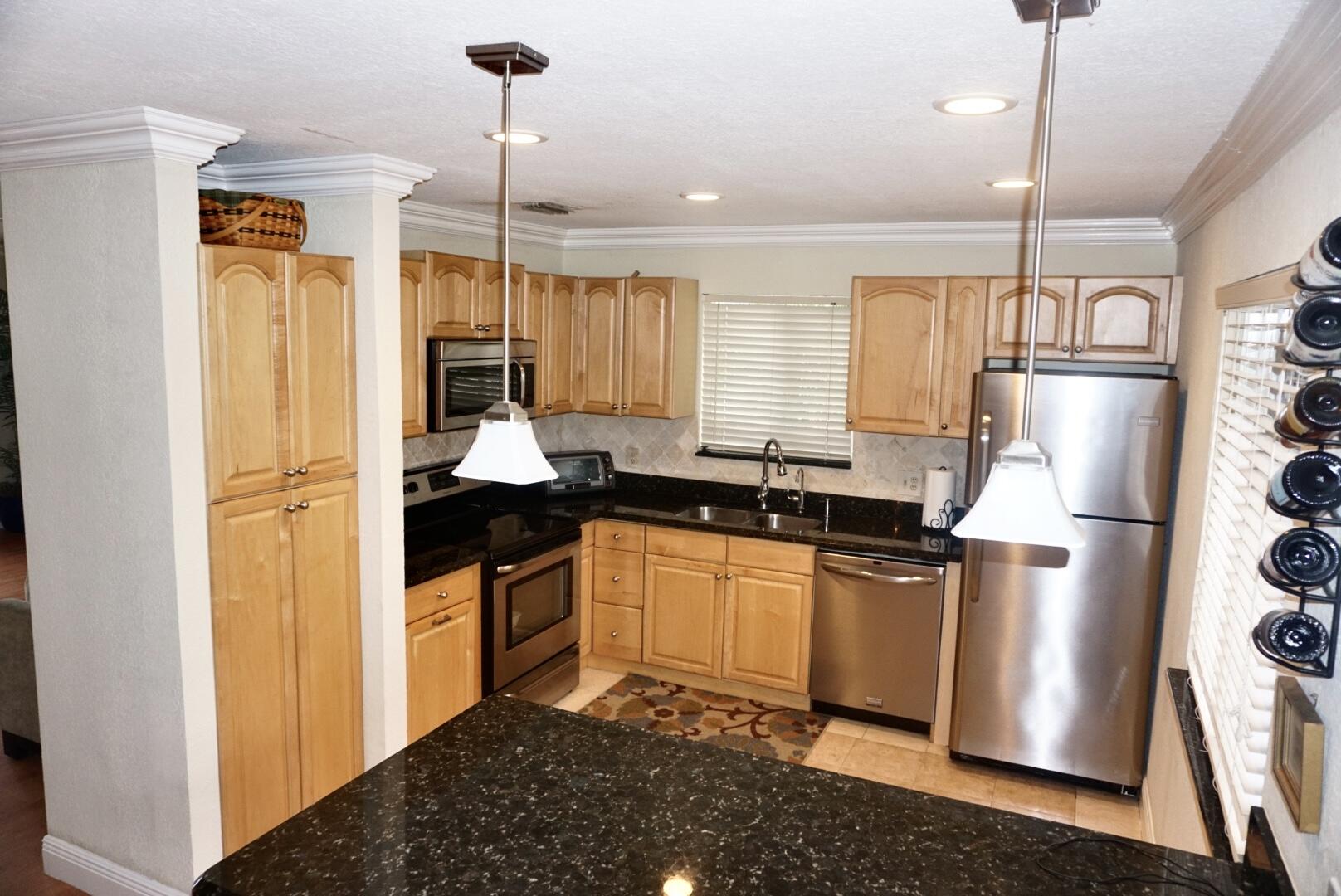 6259 Garrett Street Jupiter, FL 33458 - Photo 7 of 19 B033A47B-3C4C-4F3D-9EBF-9C5A37D34D62