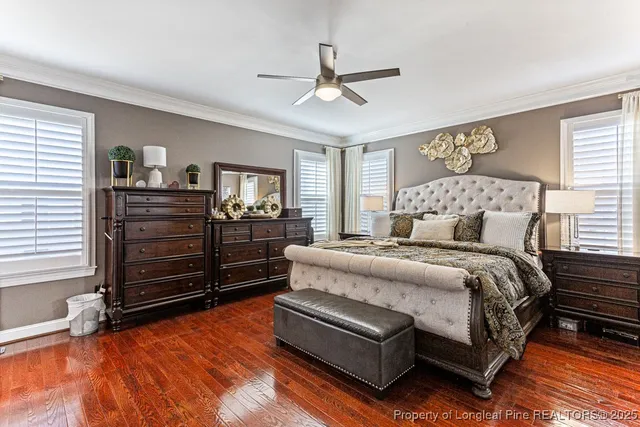 a bedroom with a bed and furniture