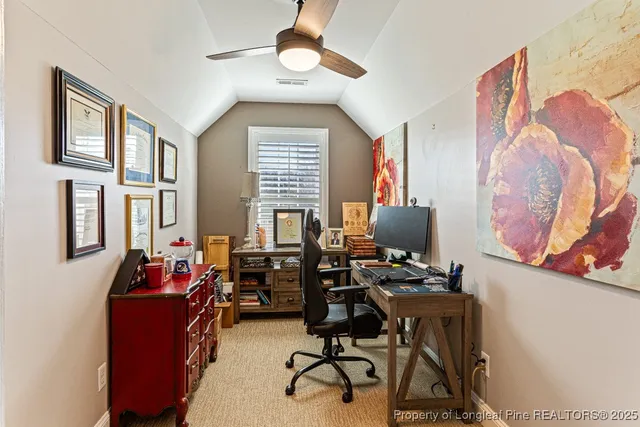 a room with furniture and musical instruments