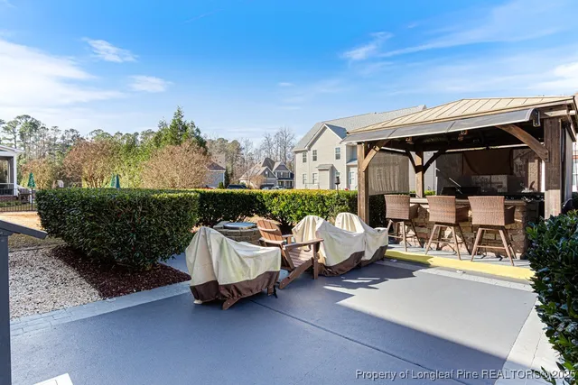 a view of roof with sitting area