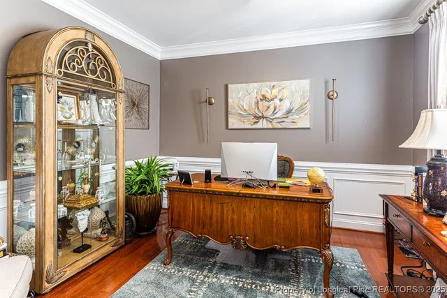 a view of a workspace with furniture and toys