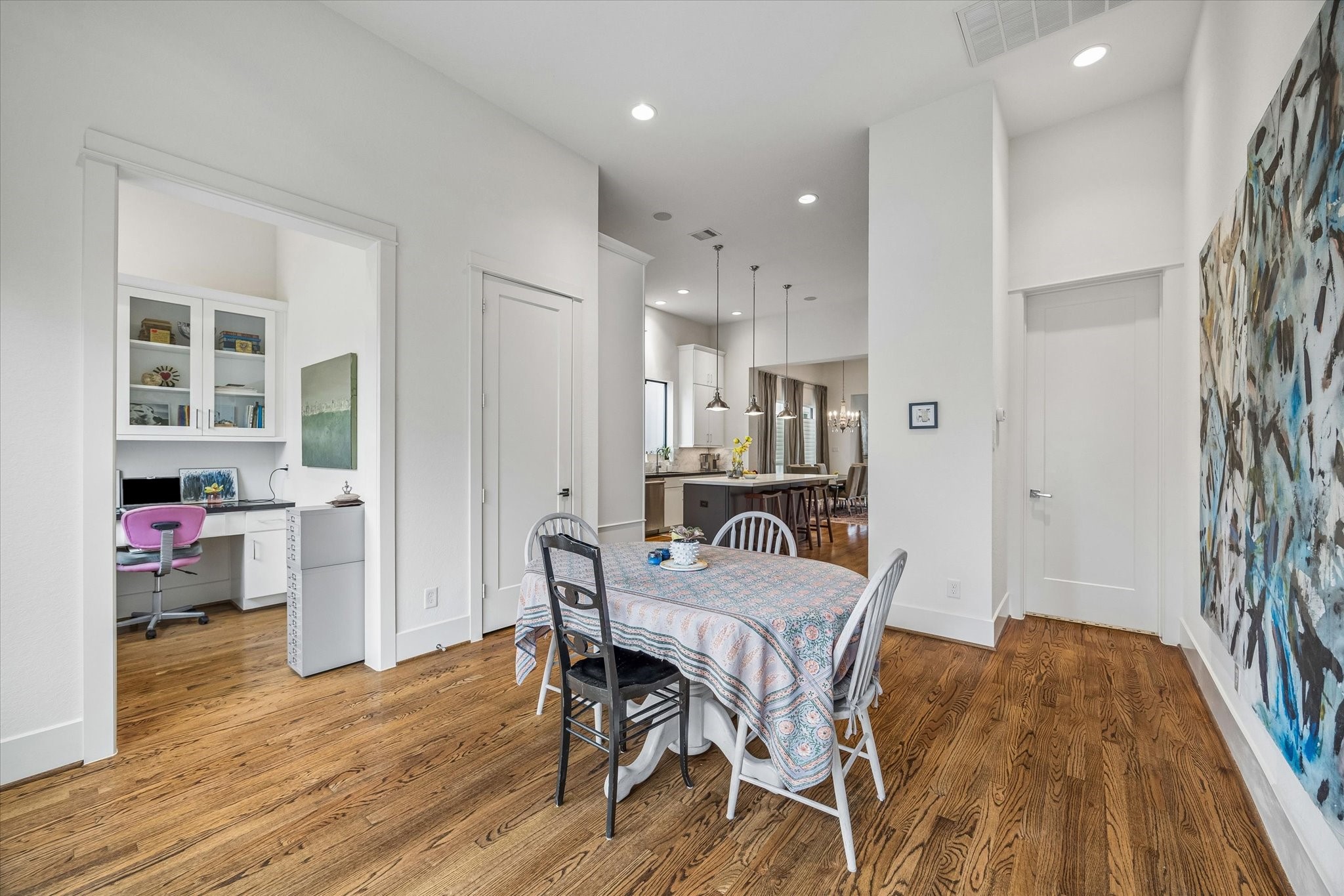 1526 Vermont Street Houston, TX 77006 - Photo 24 of 39 Light-filled den with hardwood floors and versatility for dining, work, or lounge use.