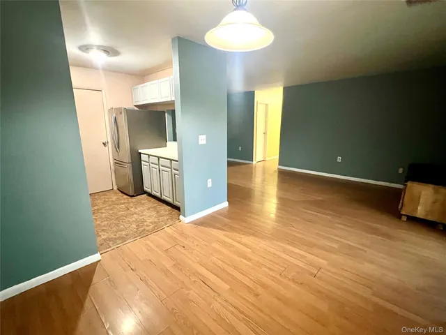a stove top oven sitting inside of a kitchen