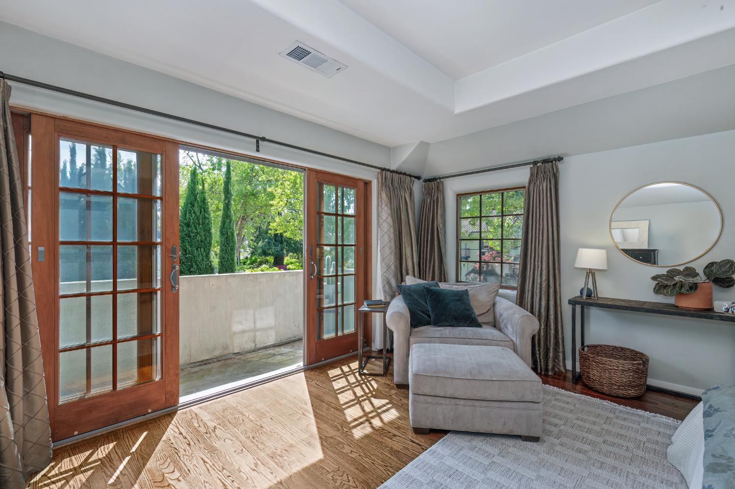 3501 Cutter Way Sacramento, CA 95818 - Photo 45 of 89 a living room with furniture and a floor to ceiling window