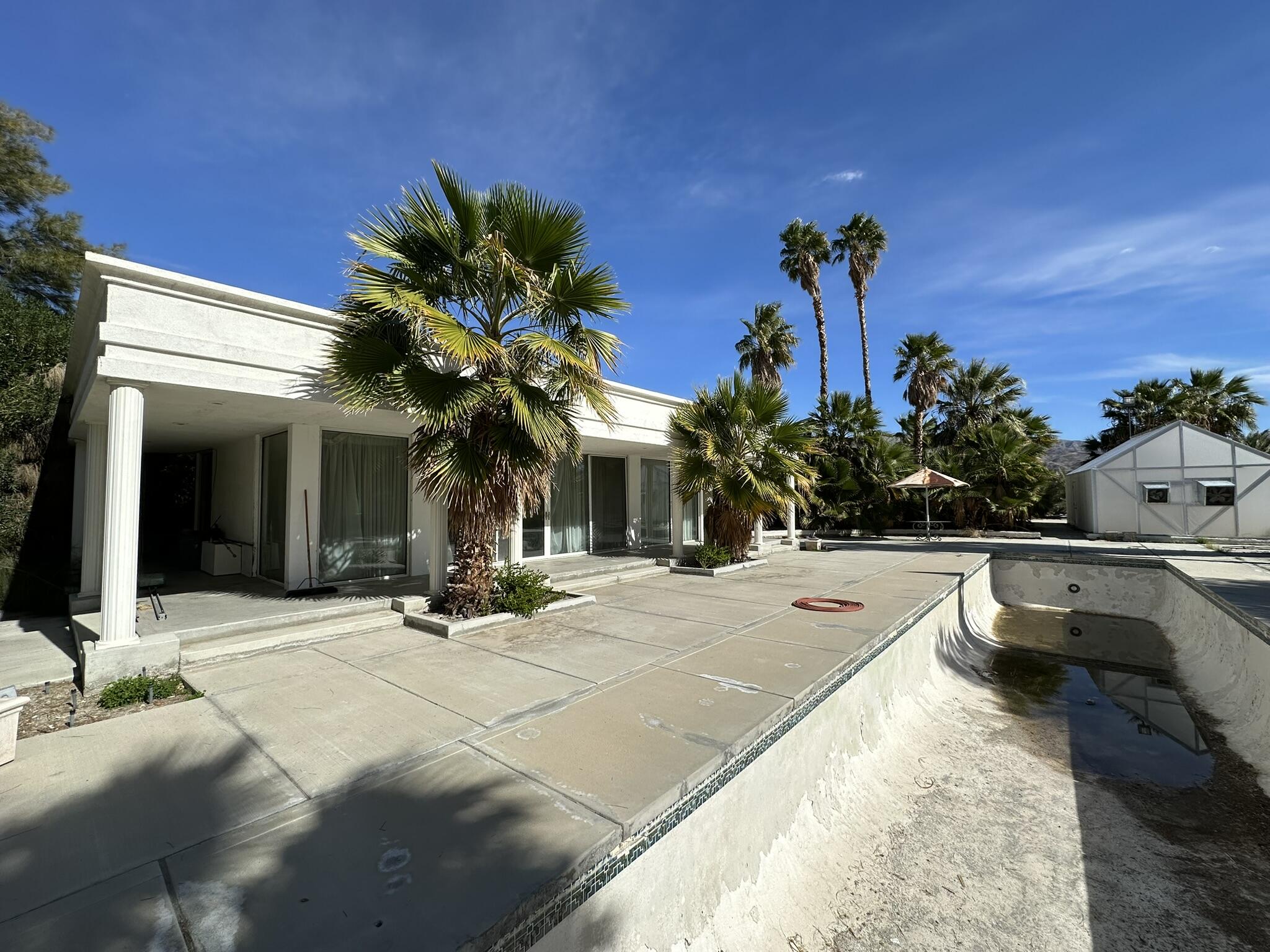 39200 Dillon Road Indio, CA 92203 - Photo 7 of 22 a view of a house with cars park