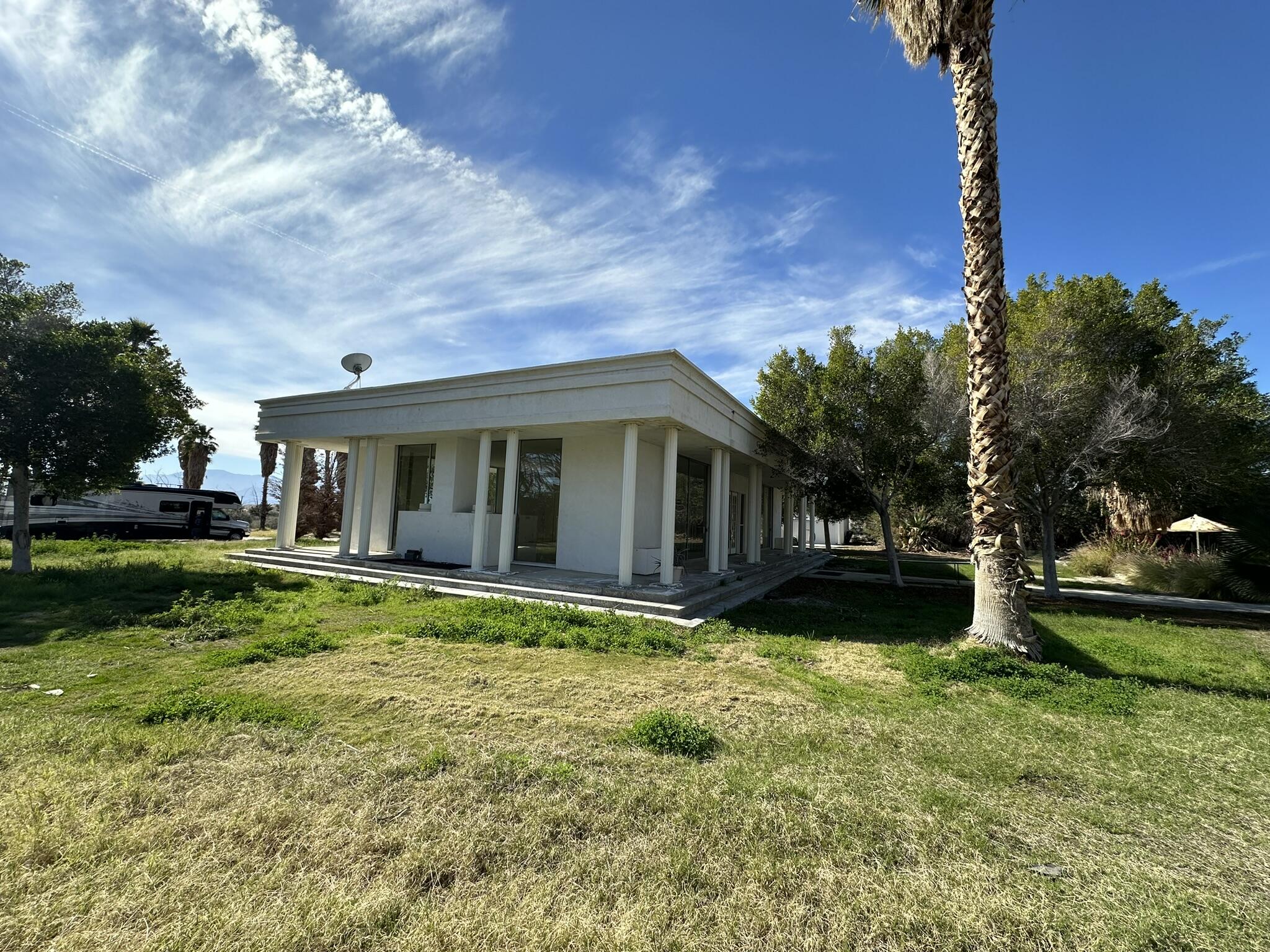 39200 Dillon Road Indio, CA 92203 - Photo 10 of 22 a view of a house with a yard and tree s