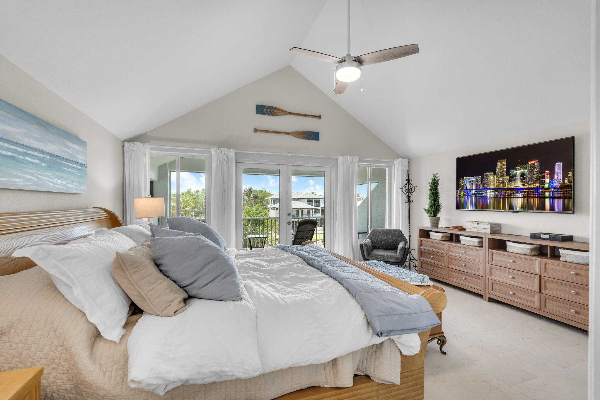24 Mutiny Place Key Largo, FL 33037 - Photo 25 of 69 a spacious bedroom with a large bed and a large window