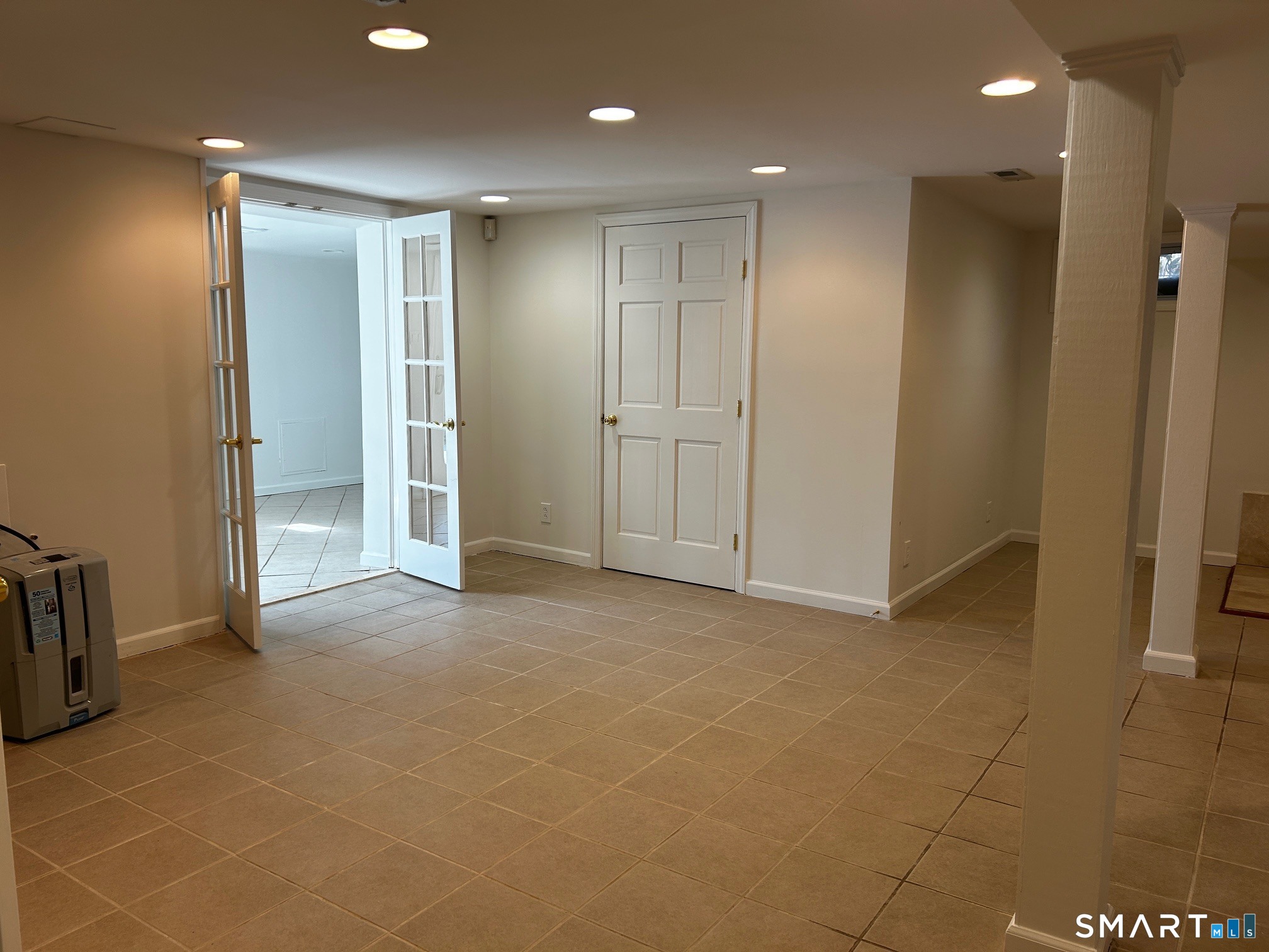 97 Godfrey Road Fairfield, CT 06825 - Photo 24 of 33 Family room.