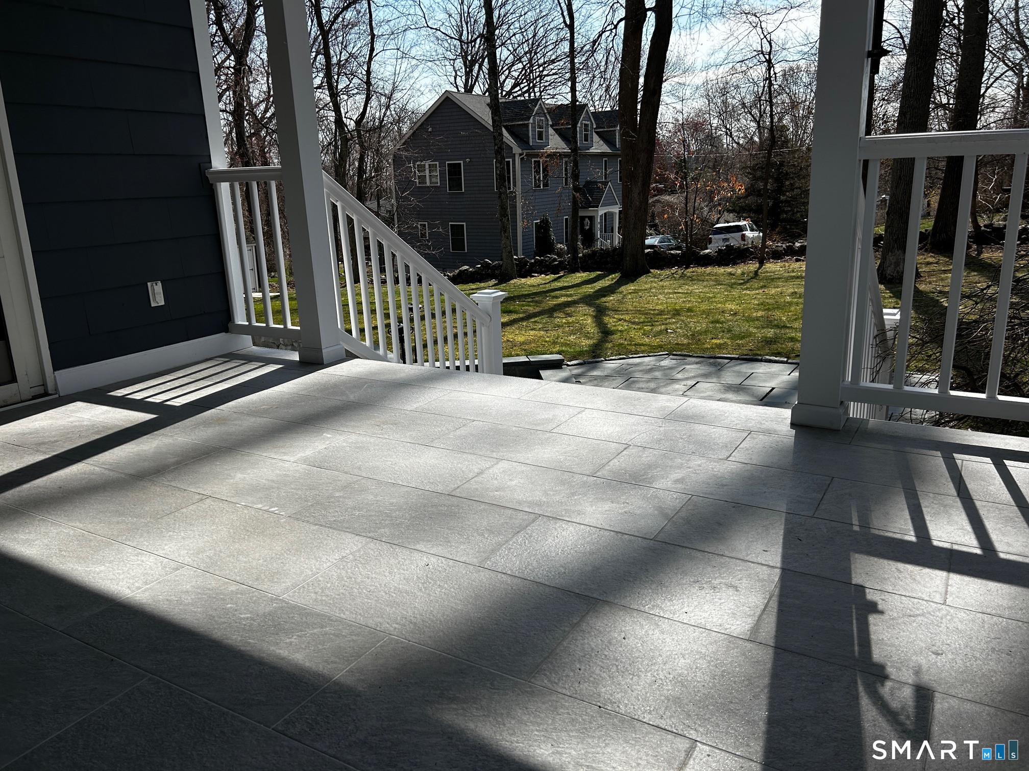 97 Godfrey Road Fairfield, CT 06825 - Photo 10 of 33 Covered deck in the back of the house.