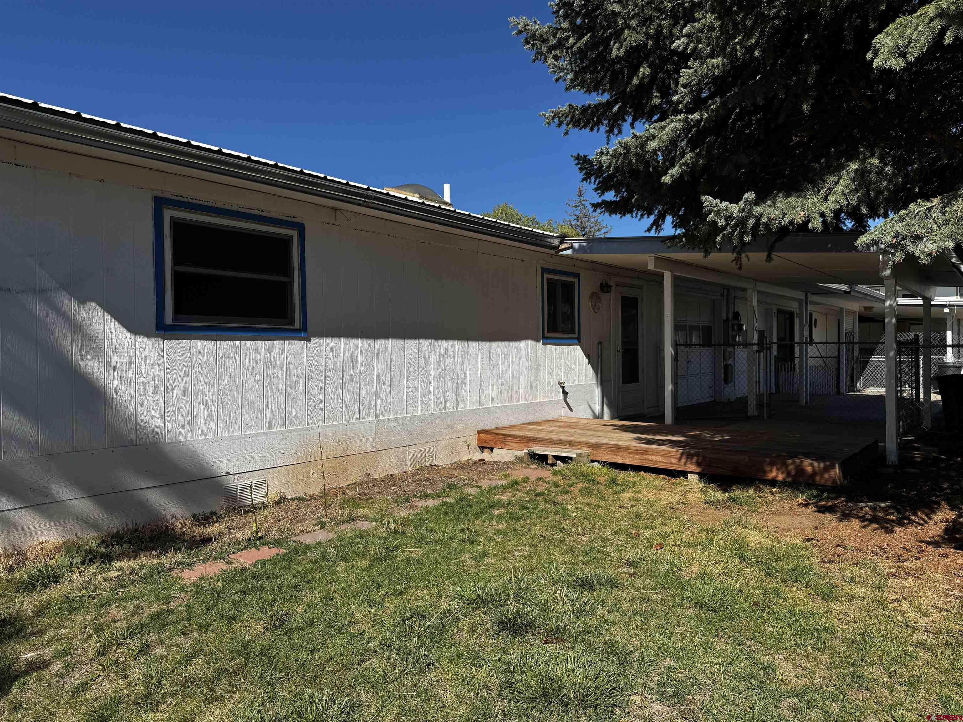 345 1/2 Northwest 4th Street Cedaredge, CO 81413 - Photo 19 of 28 a view of a backyard
