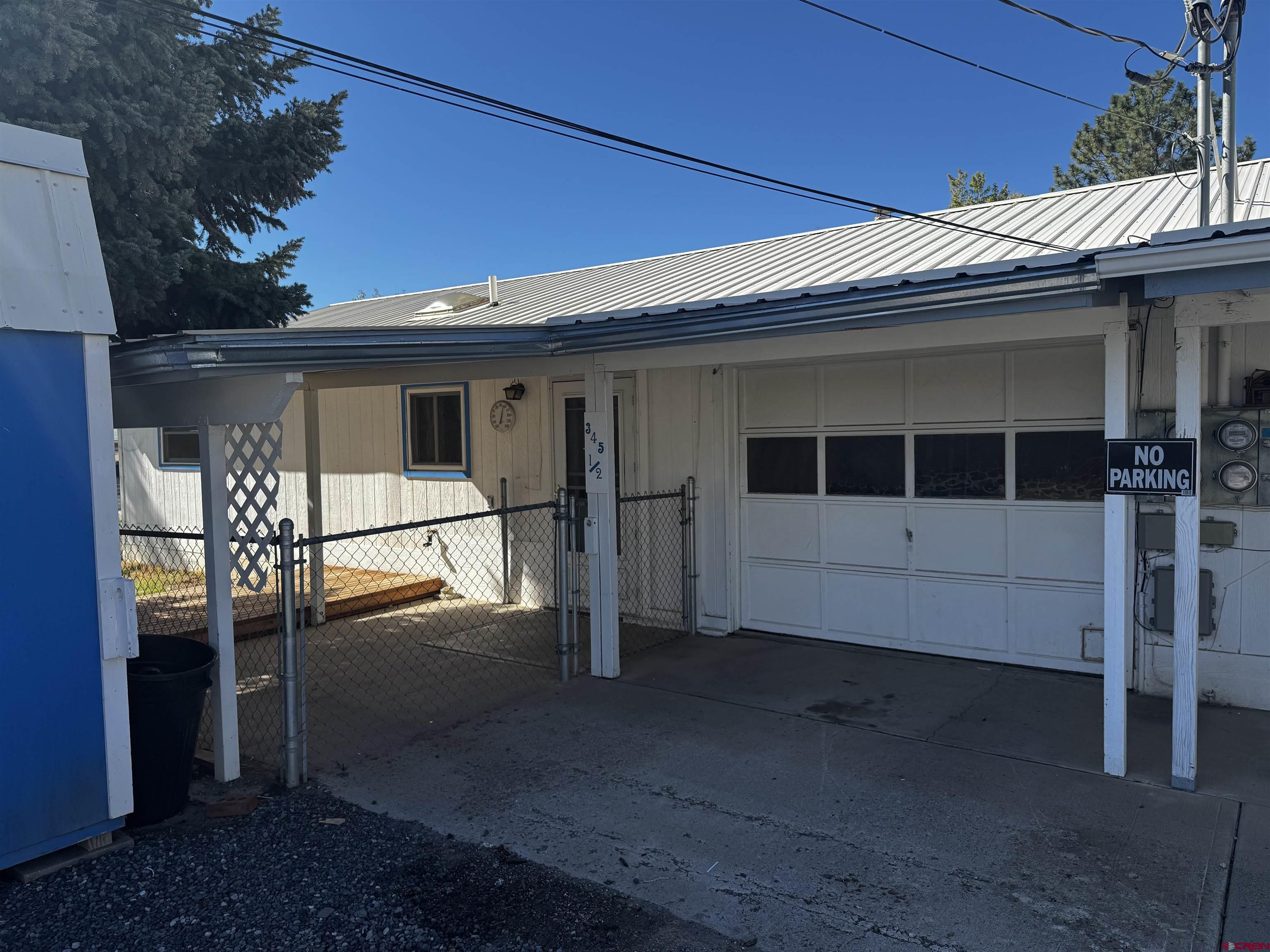 345 1/2 Northwest 4th Street Cedaredge, CO 81413 - Photo 25 of 28 a view of a house with a large window