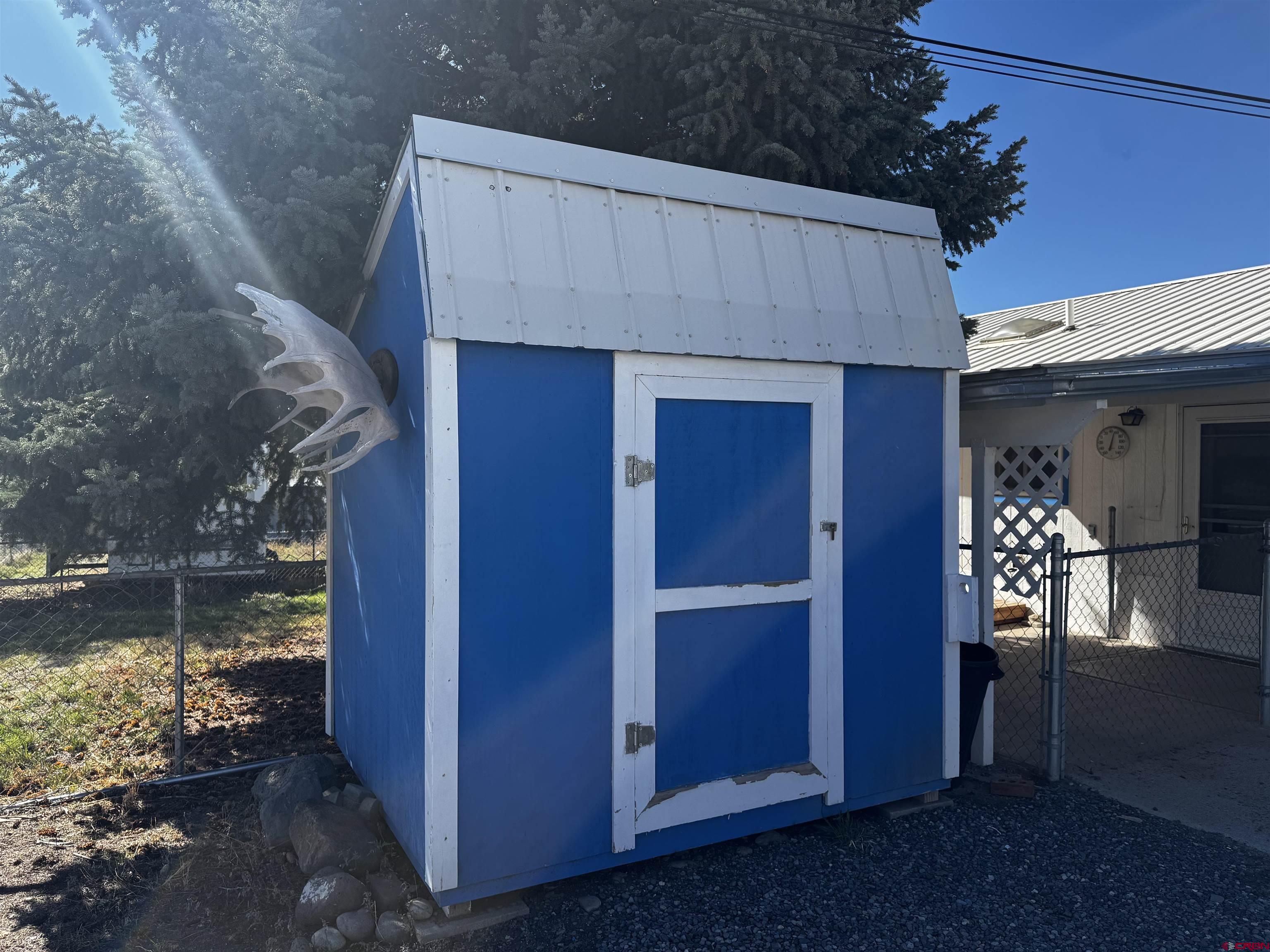 345 1/2 Northwest 4th Street Cedaredge, CO 81413 - Photo 26 of 28 a backyard of a house