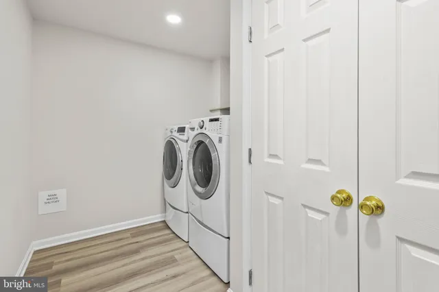 a view of a storage & utility room with a sink
