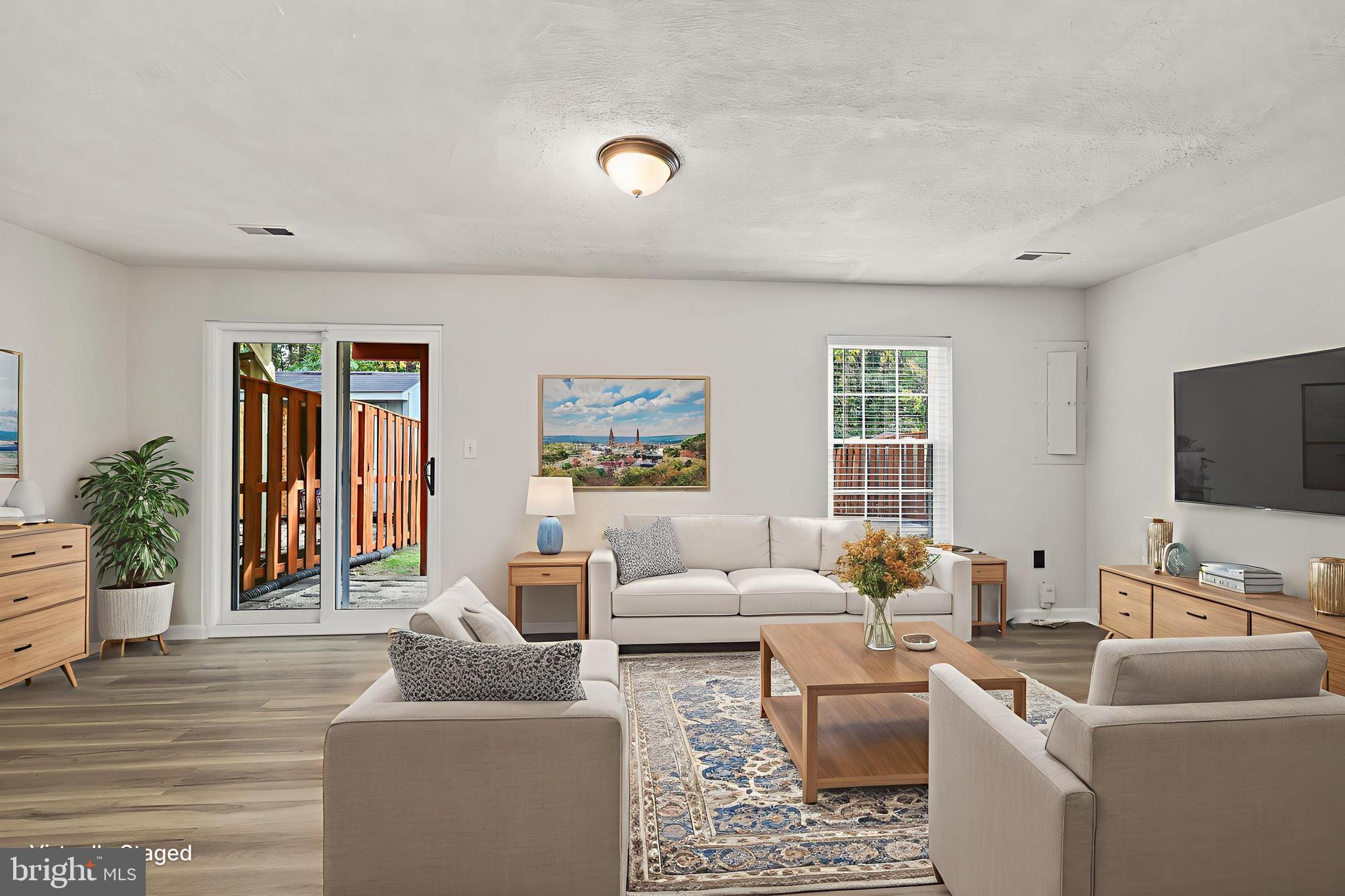 306 Kings Crest Drive Stafford, VA 22554 - Photo 3 of 41 a living room with furniture and a flat screen tv