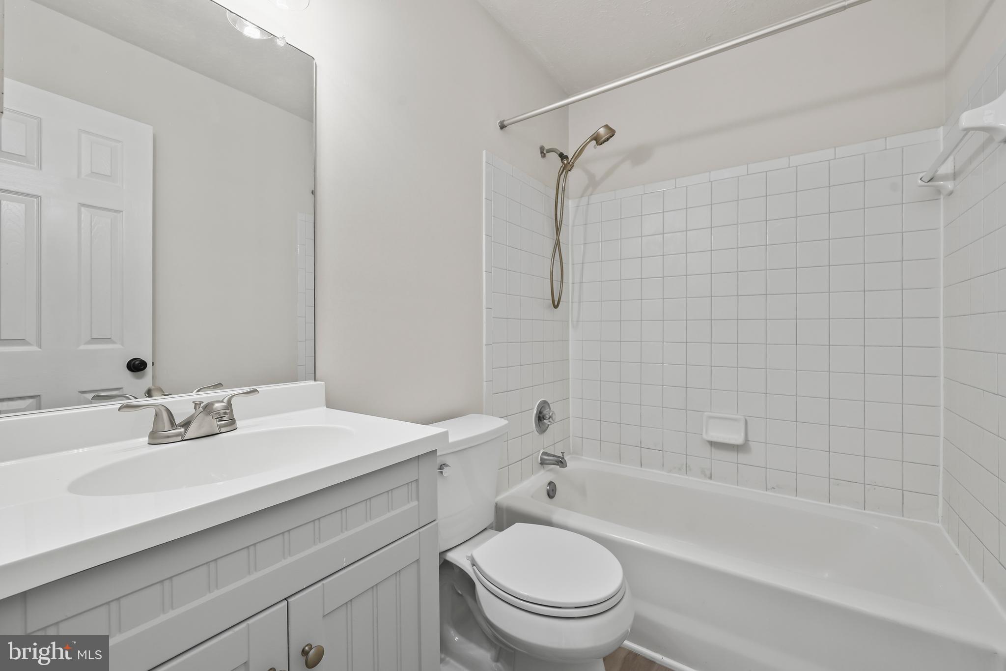 306 Kings Crest Drive Stafford, VA 22554 - Photo 32 of 41 a bathroom with a sink a toilet and shower