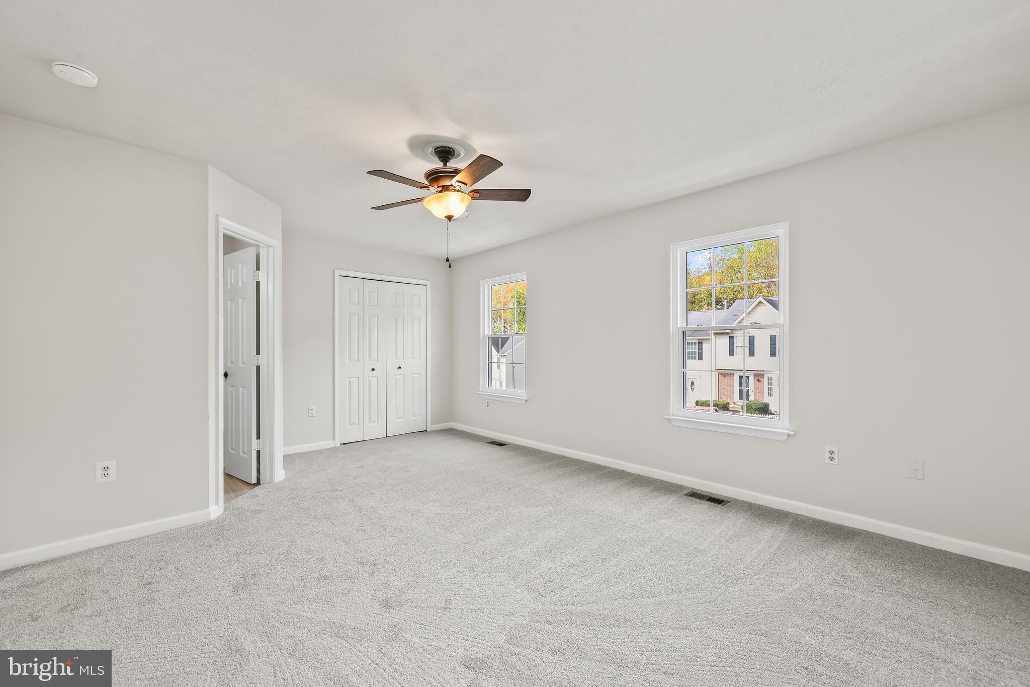 306 Kings Crest Drive Stafford, VA 22554 - Photo 33 of 41 an empty room with a window and a ceiling fan