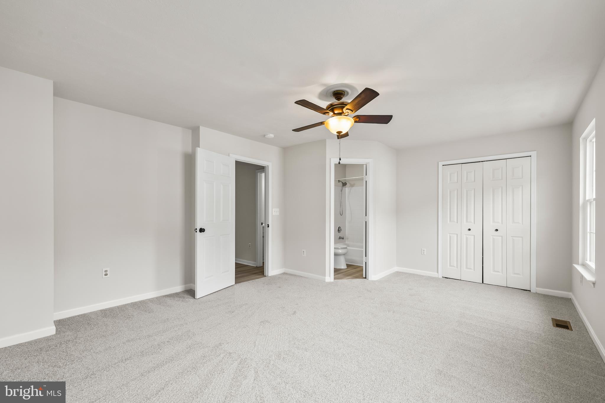 306 Kings Crest Drive Stafford, VA 22554 - Photo 34 of 41 a view of an empty room with chandelier fan and fire place