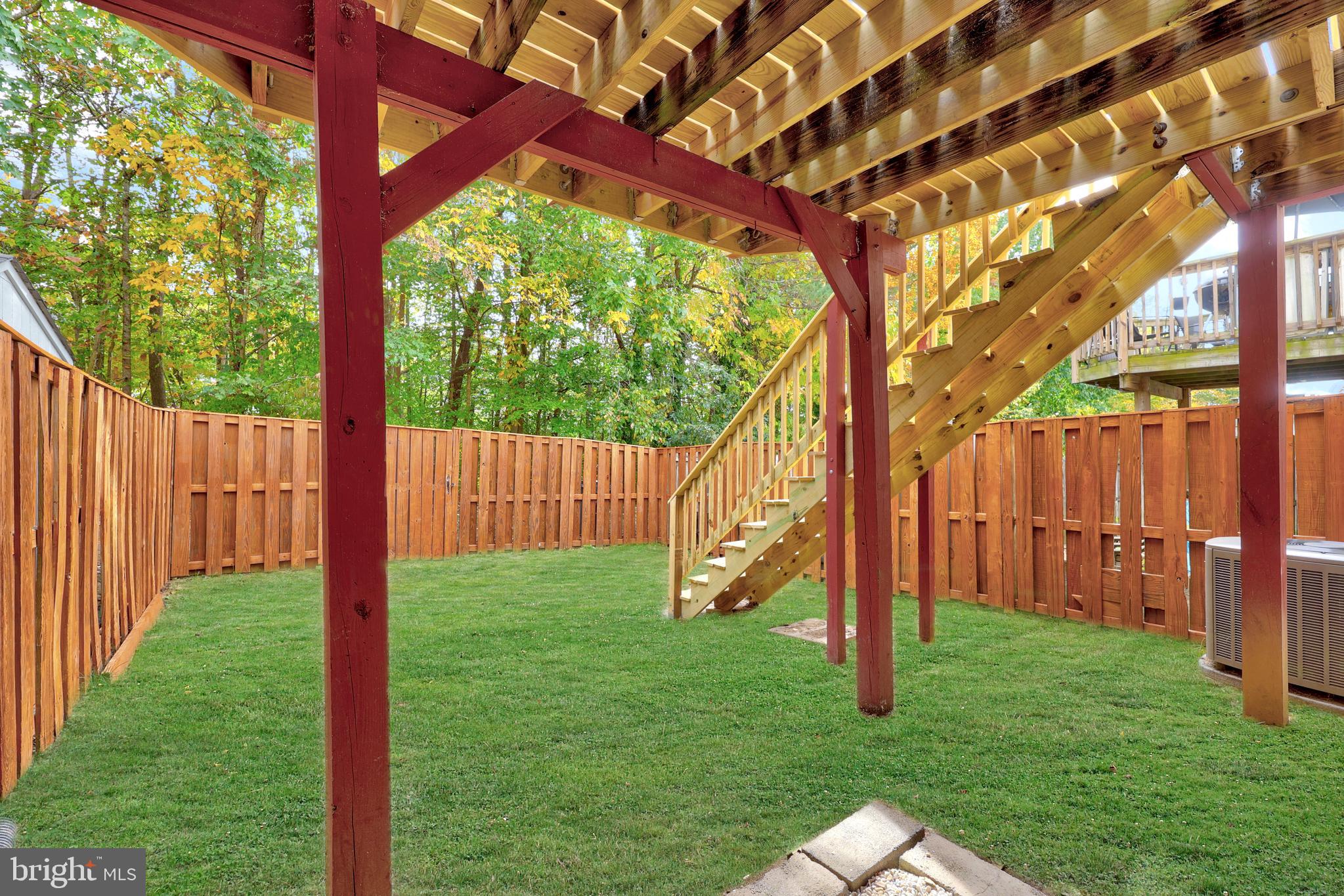 306 Kings Crest Drive Stafford, VA 22554 - Photo 41 of 41 a view of backyard with a barn and a large tree