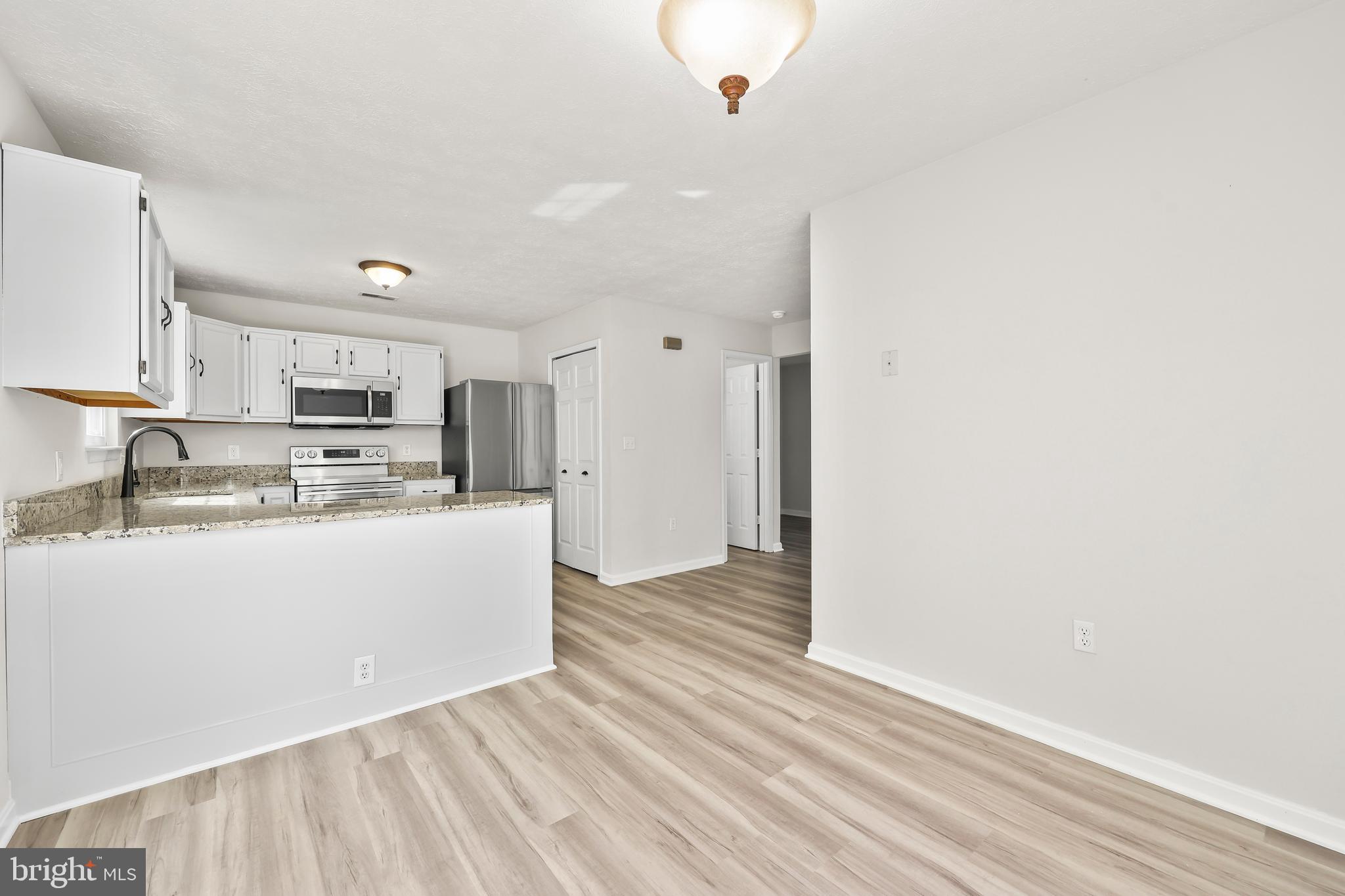 306 Kings Crest Drive Stafford, VA 22554 - Photo 10 of 41 a view of kitchen with wooden floor