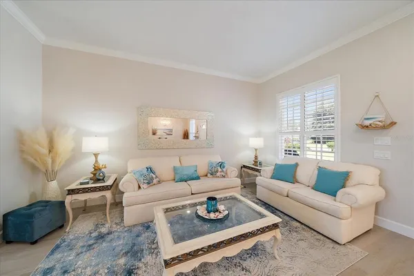 a living room with furniture and a table