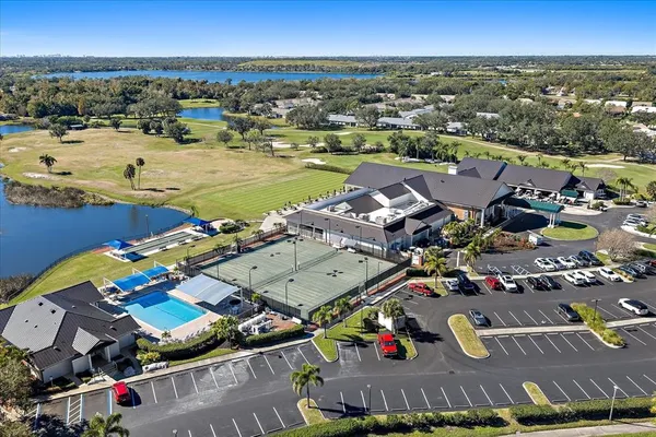 an aerial view of a house with a swimming pool
