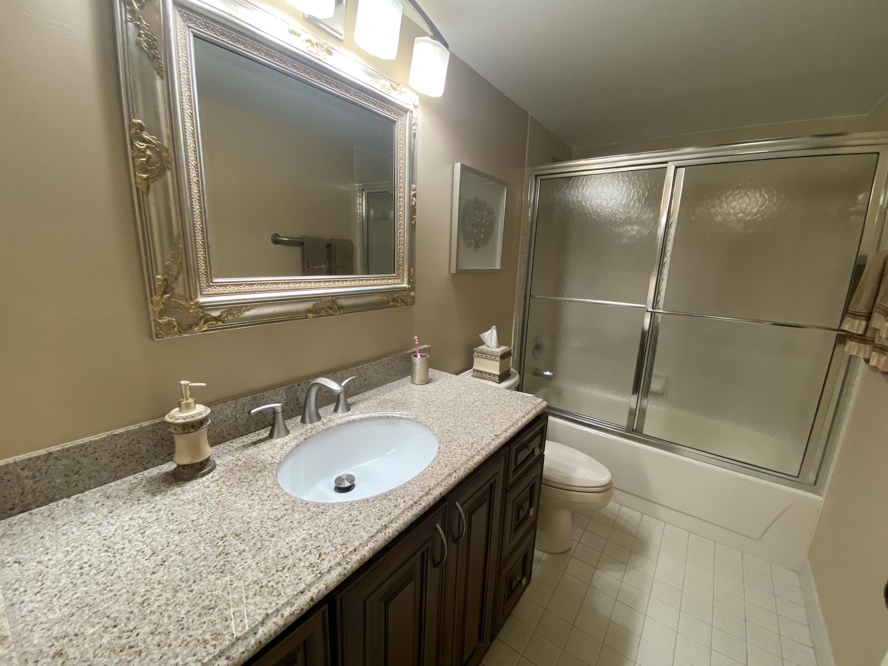 15075 Witney Road, Unit 212 Delray Beach, FL 33484 - Photo 21 of 57 Guest Bath