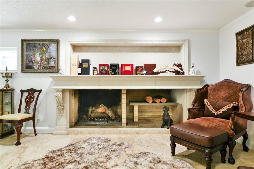 1875 Belleair Road Clearwater, FL 33764 - Photo 23 of 100 a living room with furniture and a fireplace